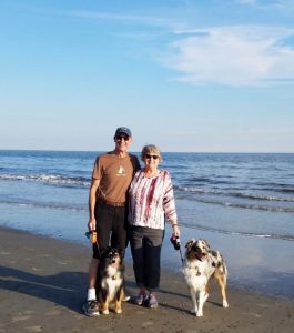 Kathy with Husband and Dogs